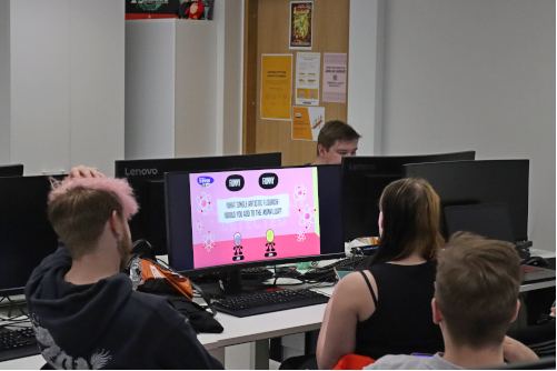 A videogame being played at Game x Cyber event.